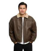 A classic men’s real leather flight jacket in dark brown, featuring a removable shearling collar, ribbed cuffs, and authentic pilot-style patch pockets.